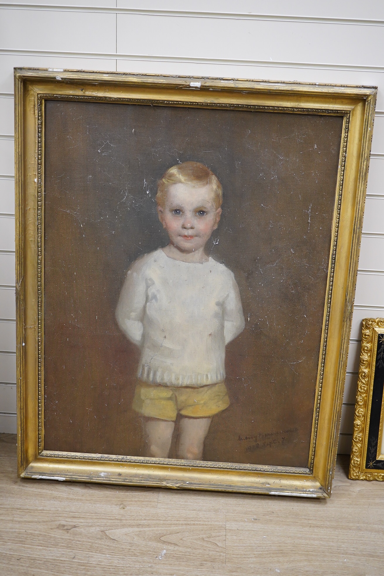 Early 20th century English School, oil on canvas, Three-quarter length portrait of a young boy, indistinctly signed and dated Sept 7th 1928, 90 x 70cm, gilt framed. Condition - fair, would benefit from a clean